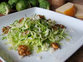 Shaved Brussels Sprouts Salad with Aged Gouda, Caramelized Walnuts, and Unfiltered Apple Cider Vinegar